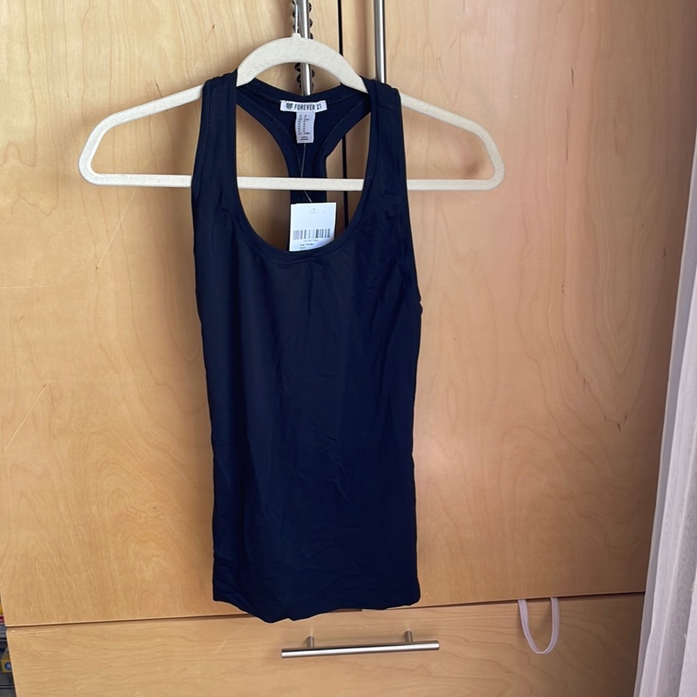 New. Tags still on. Work out apparel. Wicking fabric